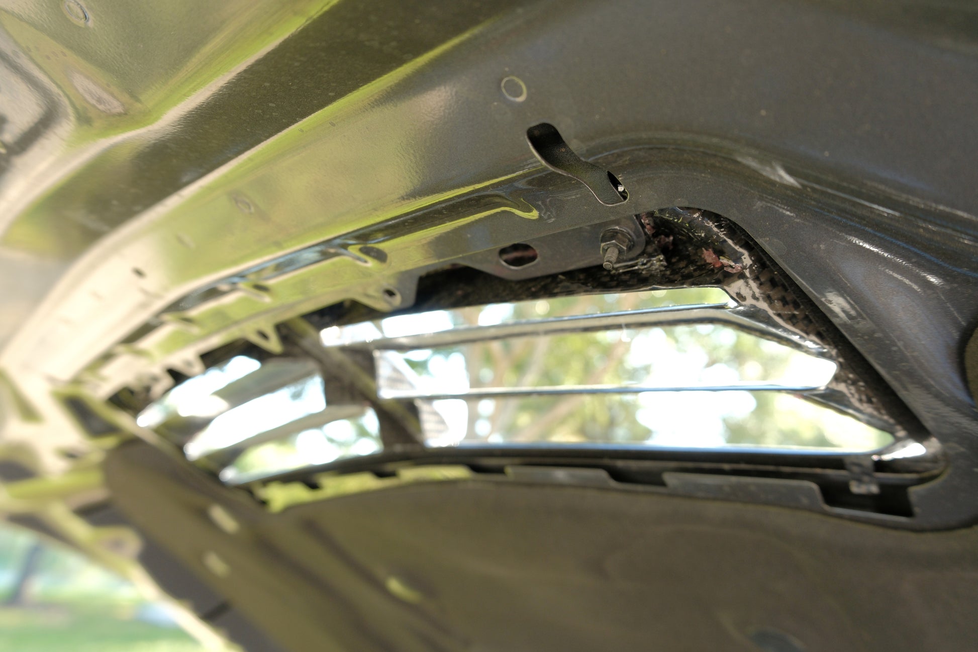Hood vent installed on car